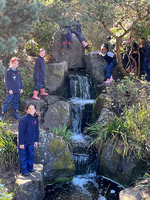 Girls by the waterfall