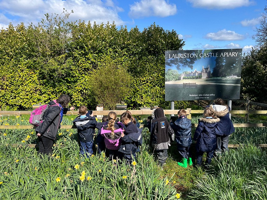 Group in front of apiary